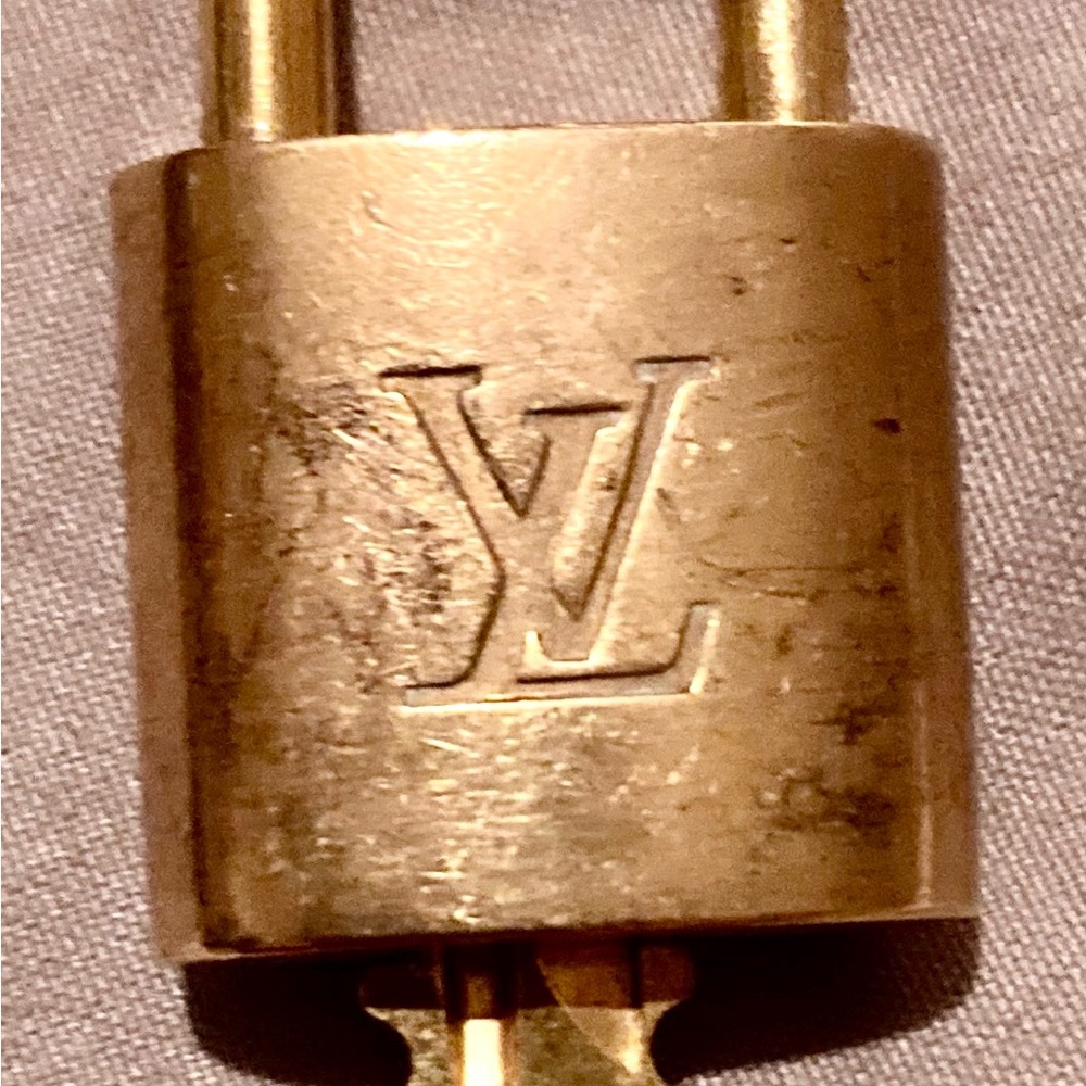 Louis Vuitton Gold Lock